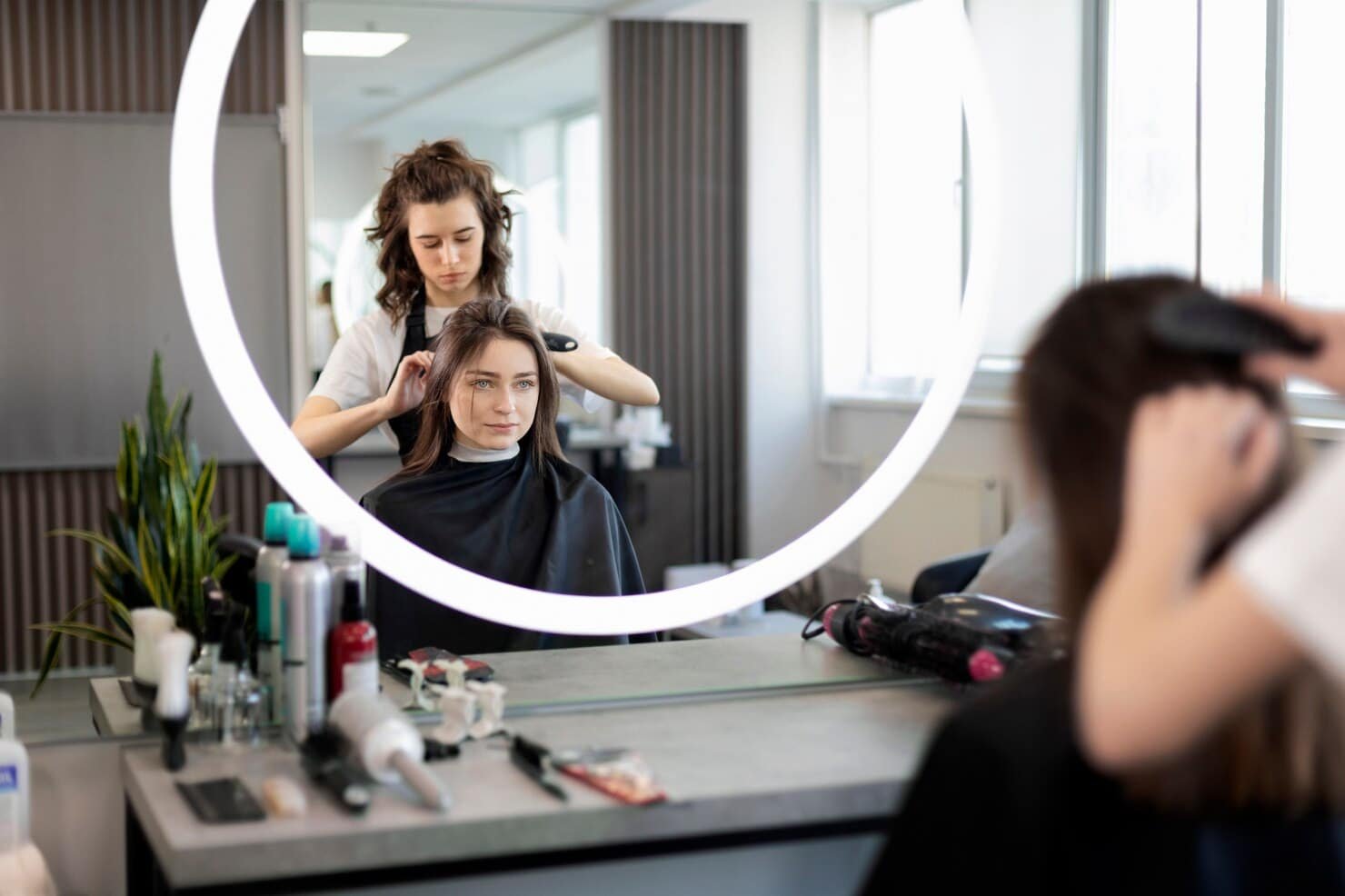 hairdresser-taking-care-her-client_23-2149319772
